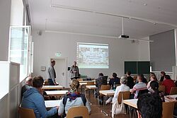 Rückenaufnahme des Publikums