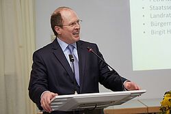 Mann beim Vortrag halten