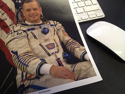 Bild des Astronauten und Unterschrift