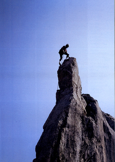 Bergspitze und Kletterer